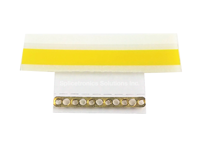 Strip of yellow splice tape 8mm connected with a brass shim